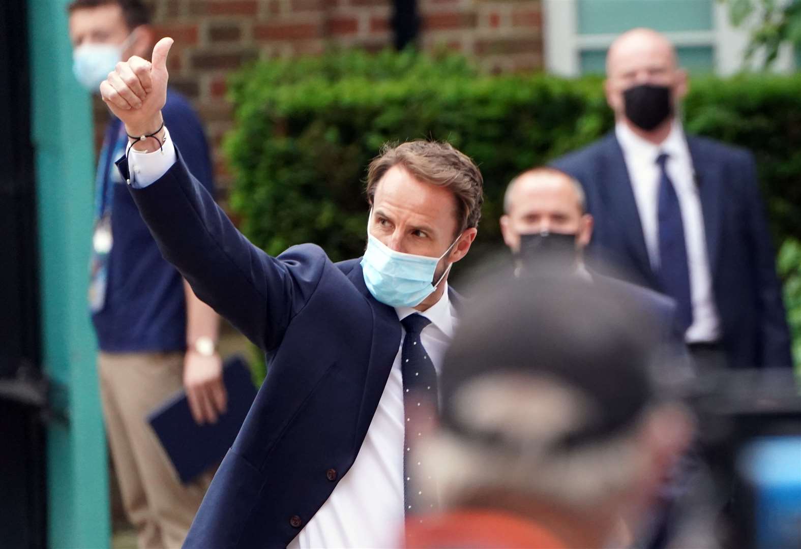 England manager Gareth Southgate gave a thumbs up as the team left the Grove Hotel, Hertfordshire (Jonathan Brady/PA)