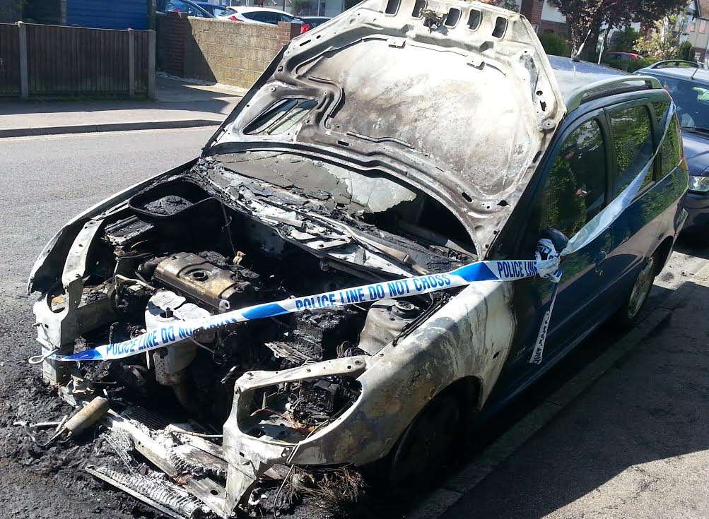 Write off: This car was found alight opposite Malcolm Waite's garage in Park Avenue.
