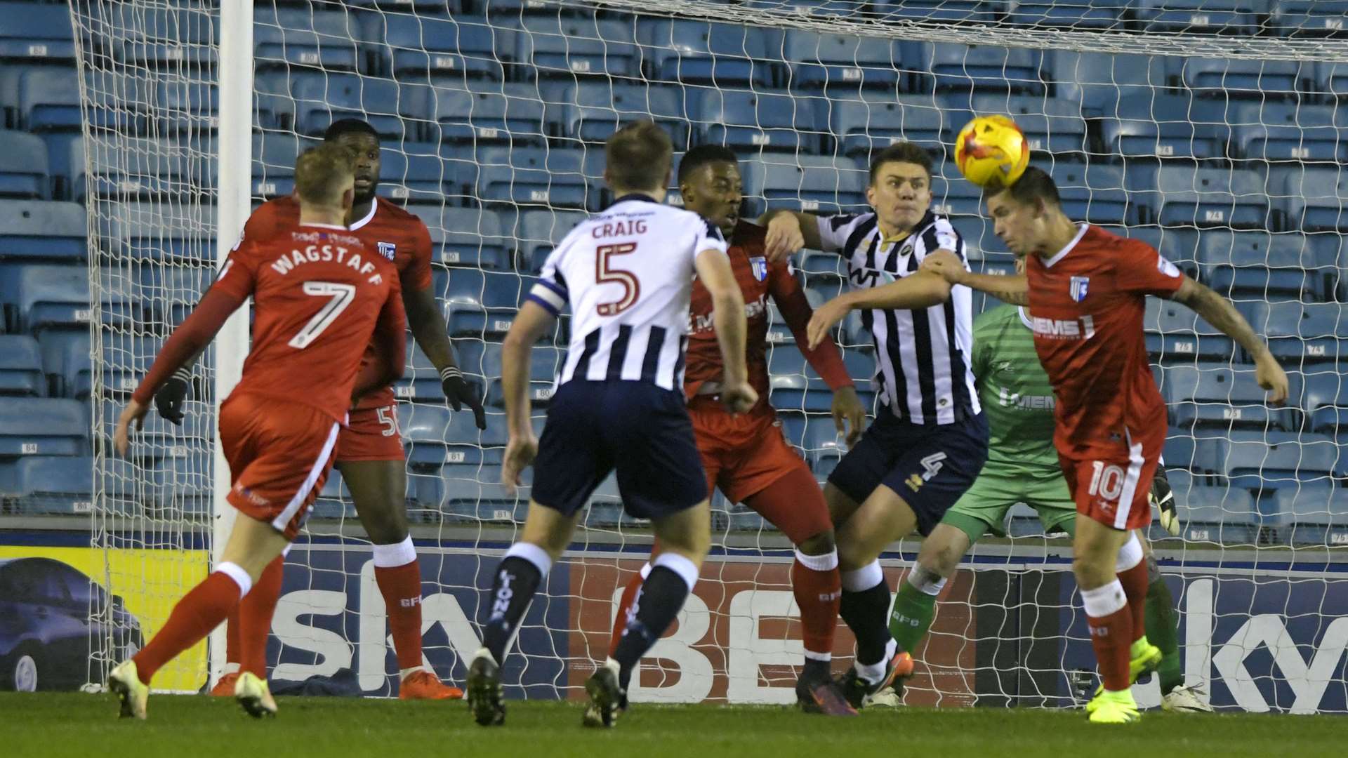 Cody McDonald heads clear in his own penalty area. Picture: Barry Goodwin