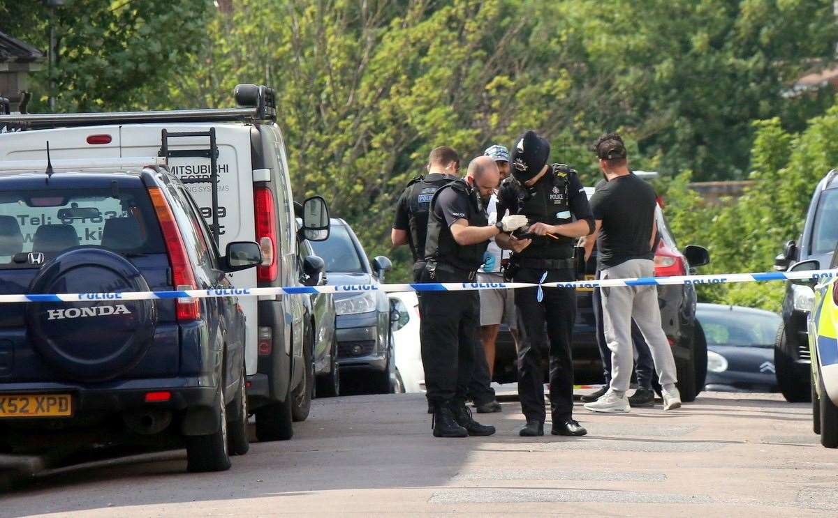 Investigation work takes place in Hartington Street after a man was stabbed. Picture: UKNiP