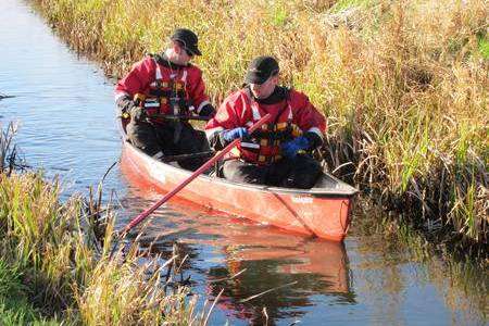 Kent Search and Rescue vounteers have been using canoes to navigate the miles of narrow waterways in the search for missing John Harvey.