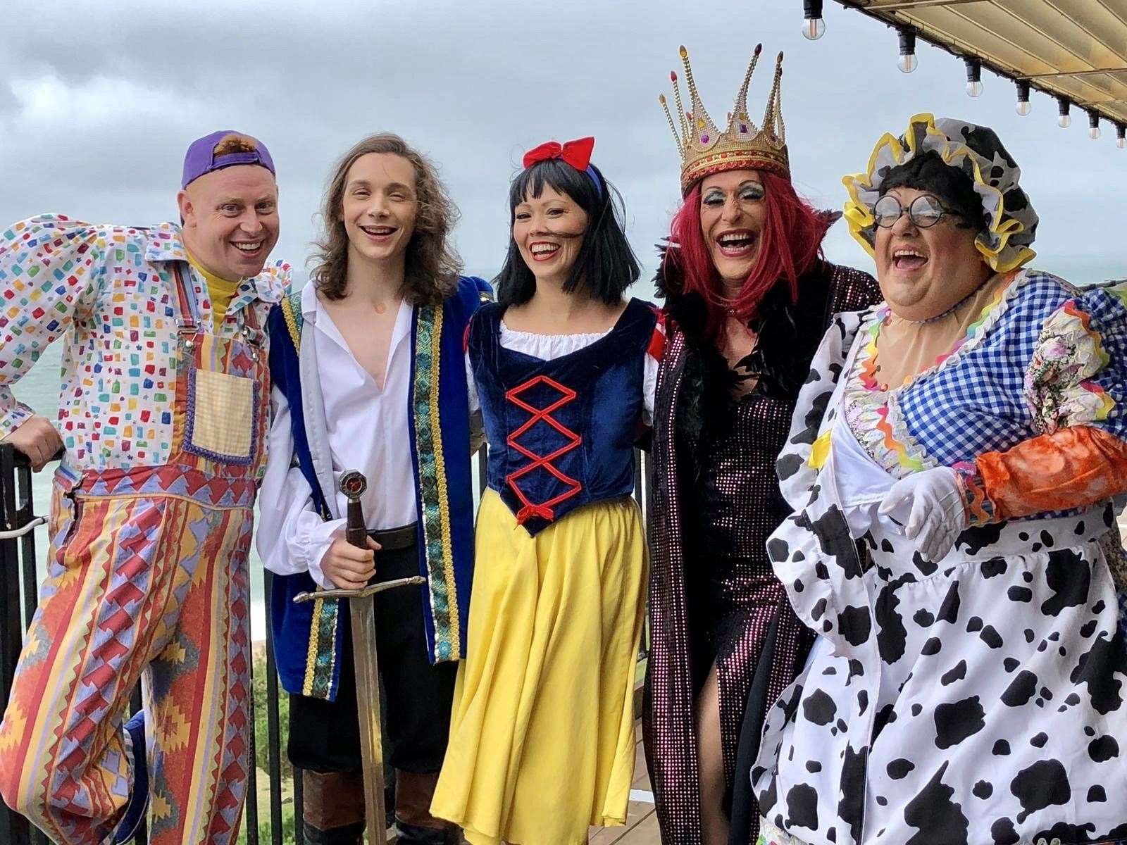 Stars of Folkestone's panto, Snow White and the Seven Dwarfs, will perform at the light turn on tonight