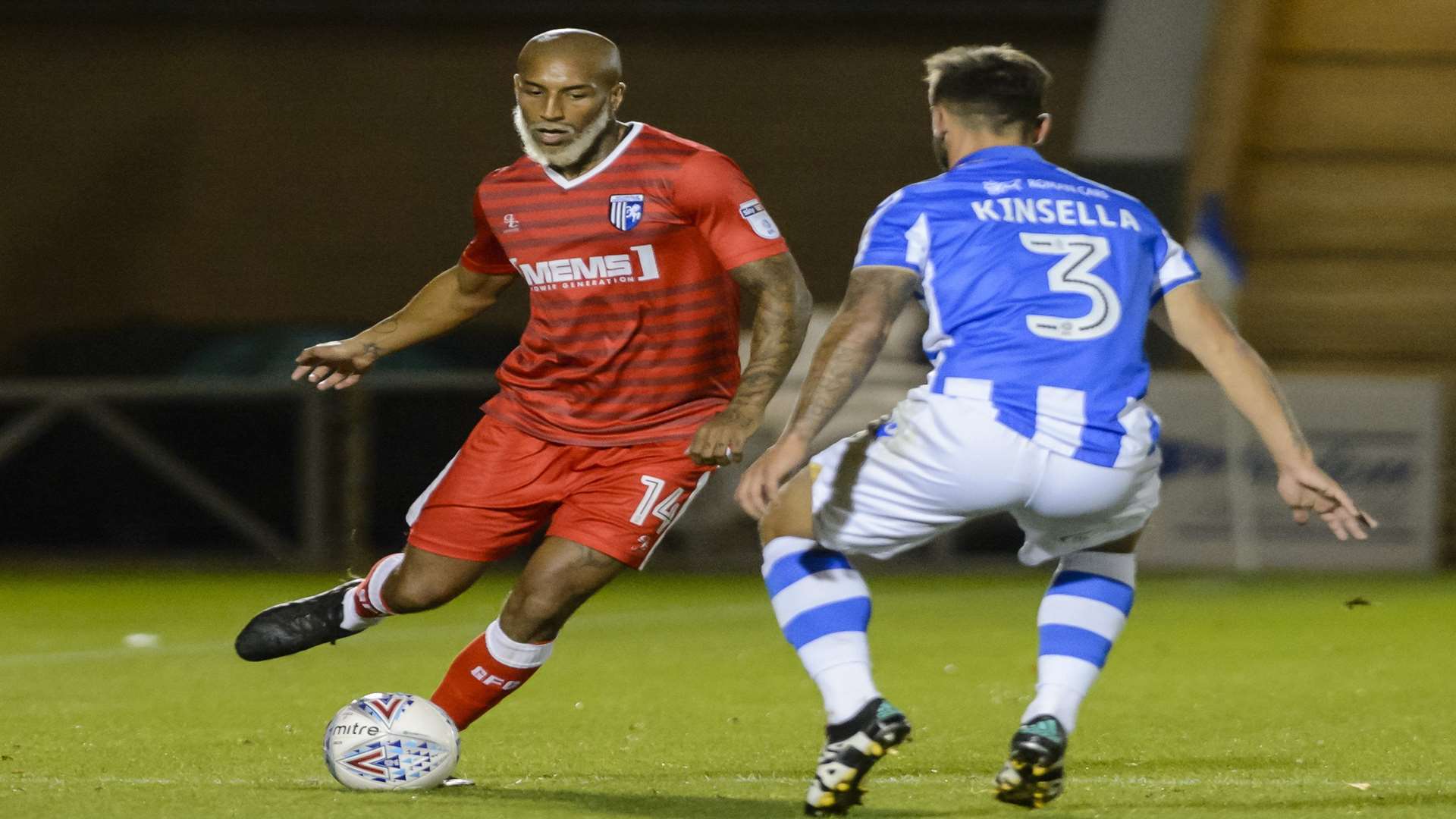 Josh Parker up against Lewis Kinsella Picture: Andy Payton