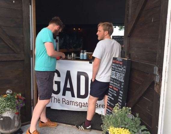 The bar is accessed through two large wooden doors and the queuing system ensures only one group of people can order drinks at a time