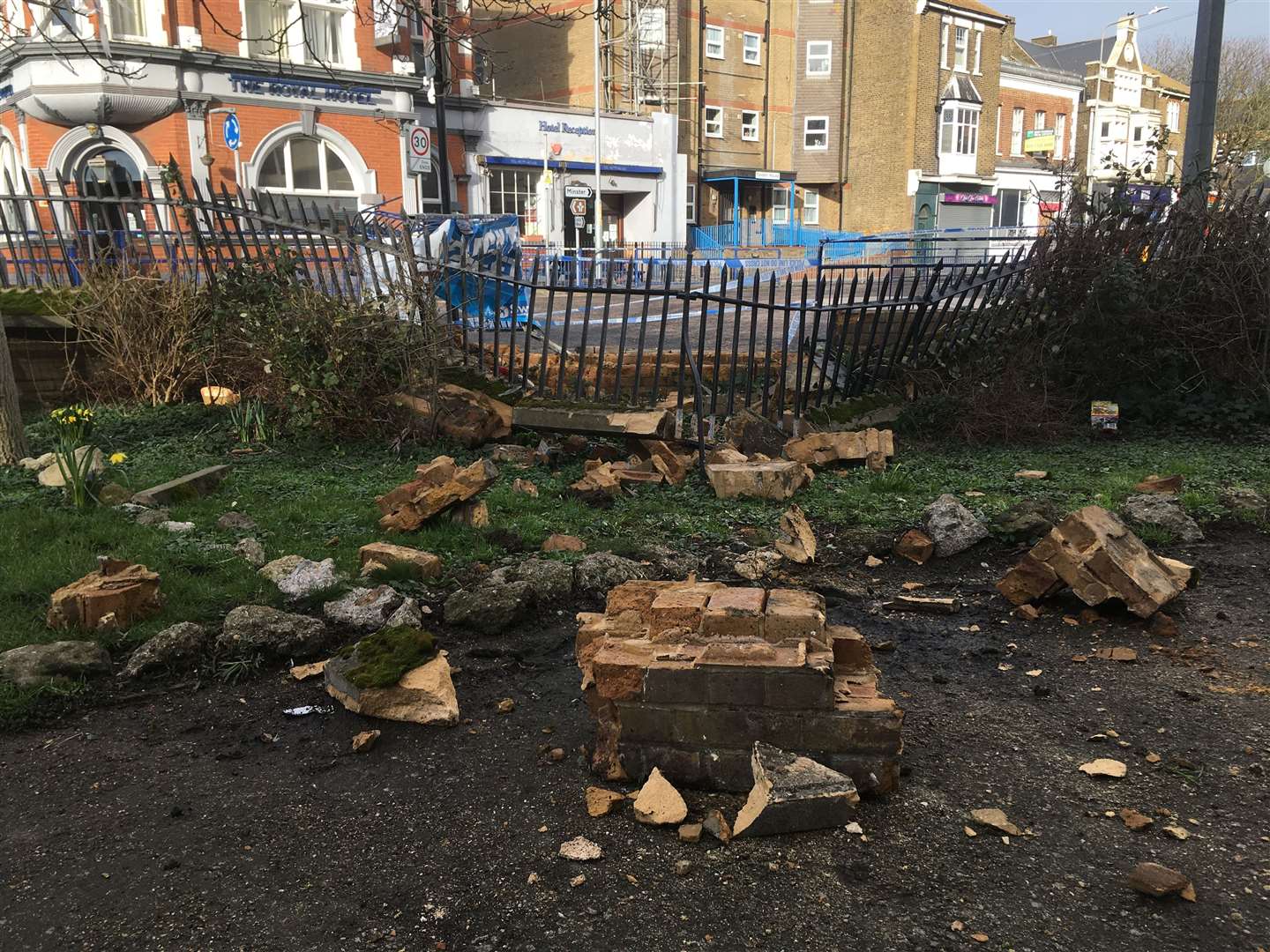 Part of the wall and railings surrounding Holy Trinity Church was demolished when a car crashed at the junction of Sheerness Broadway and Trinity Road on Wednesday night