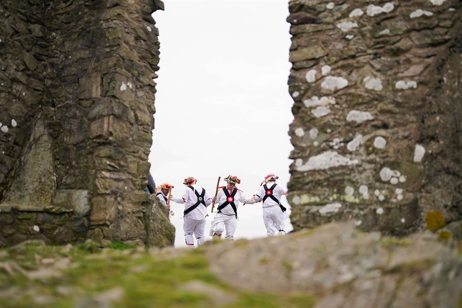 Members of the Leicester Morris Men perform at Bradgate Park (Jacob King/PA)