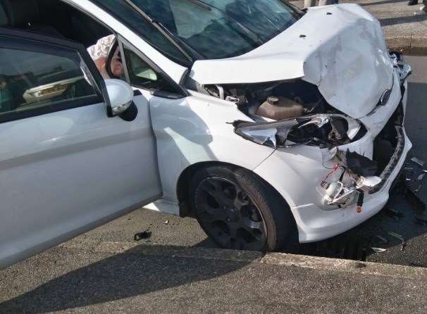 The smashed front of the white Ford Fiesta in First Avenue, Sheerness. Picture: Charlie McShane