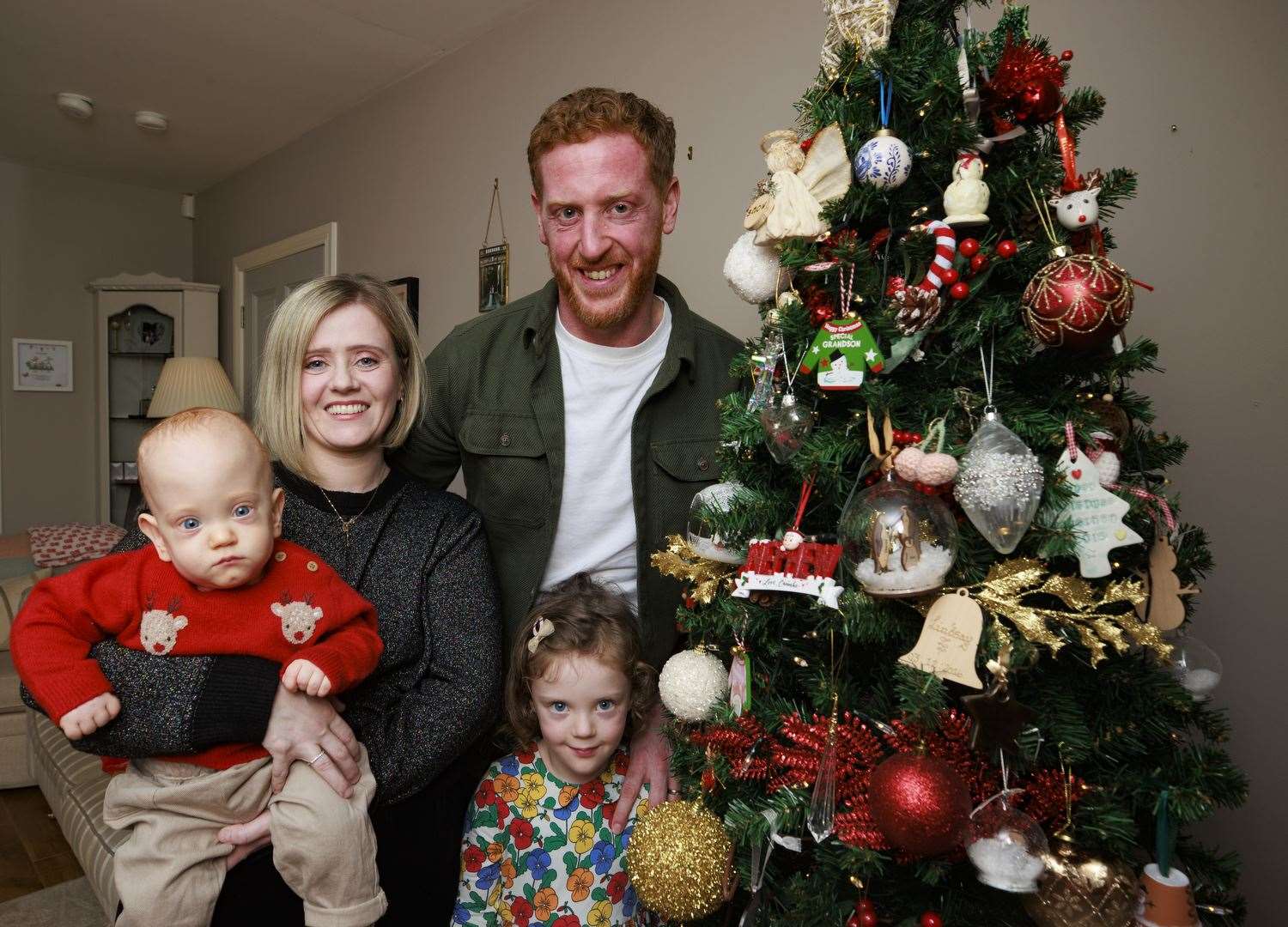 Matthew and Lindsay Ace with their four-year-old daughter Aine and 14-month-old son Iarla at their family home in Castlecaulfield (Liam McBurney/PA)