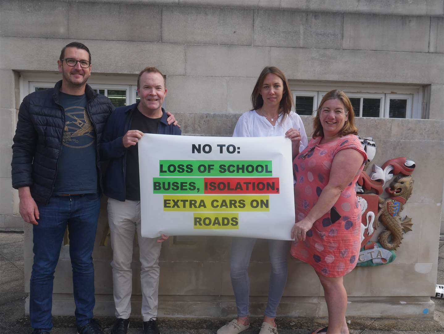 Bus cuts protesters outside County Hall in Maidstone