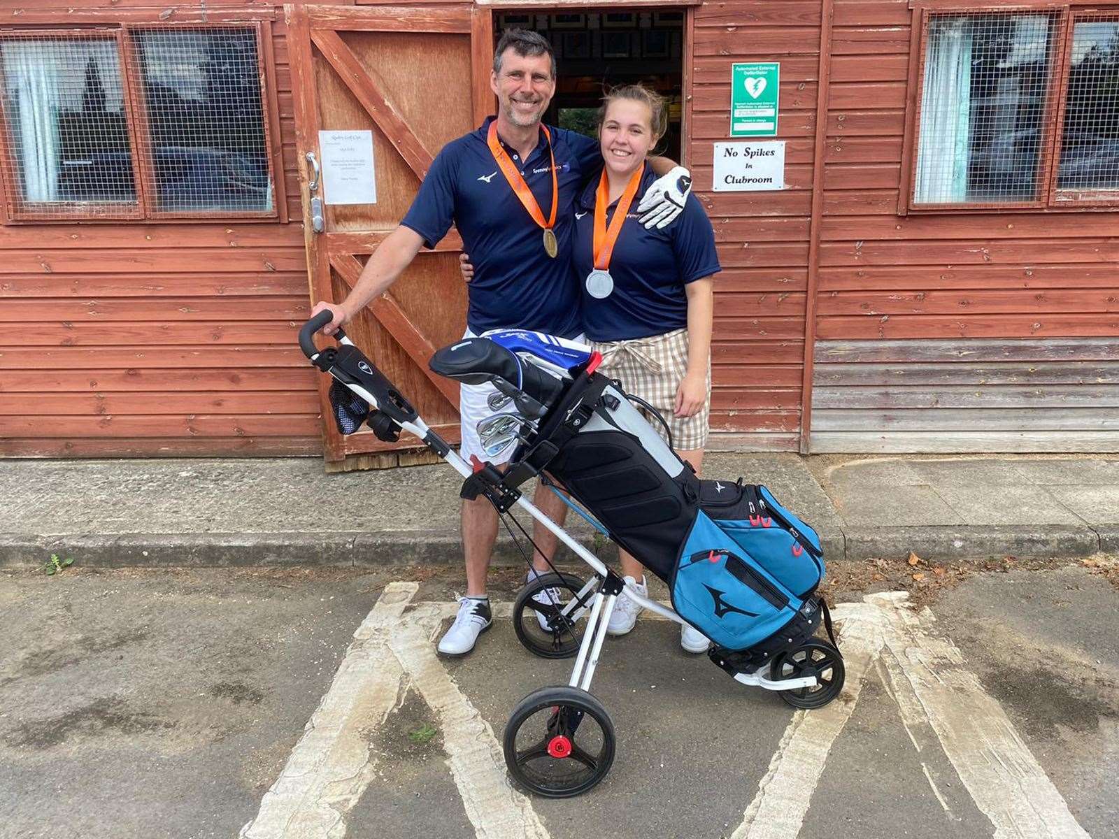 Stuart Bates and Charlotte Nichols after the golf fundraising (University of Bristol/PA)