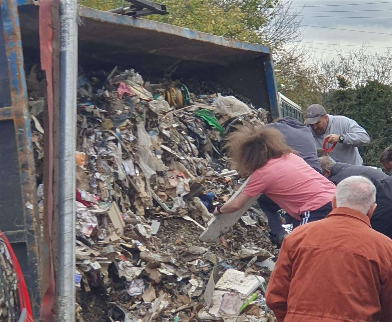 The contents of the HGV have spilled onto the pavement. Picture: Clint Else