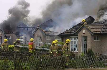 Fire crews tackle the blaze at Minster Chalet Park