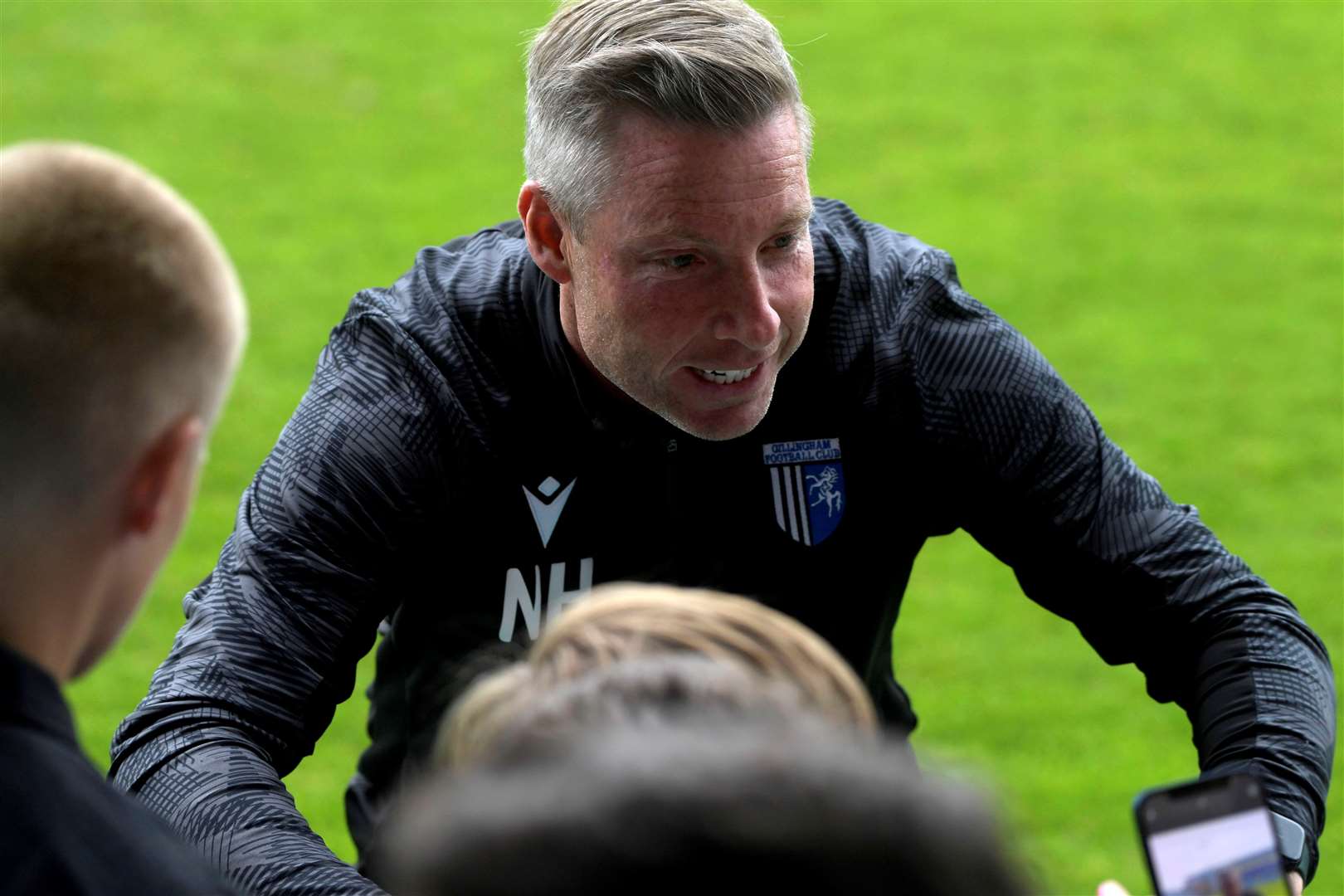 Manager Neil Harris with fans at the open session Picture: Barry Goodwin