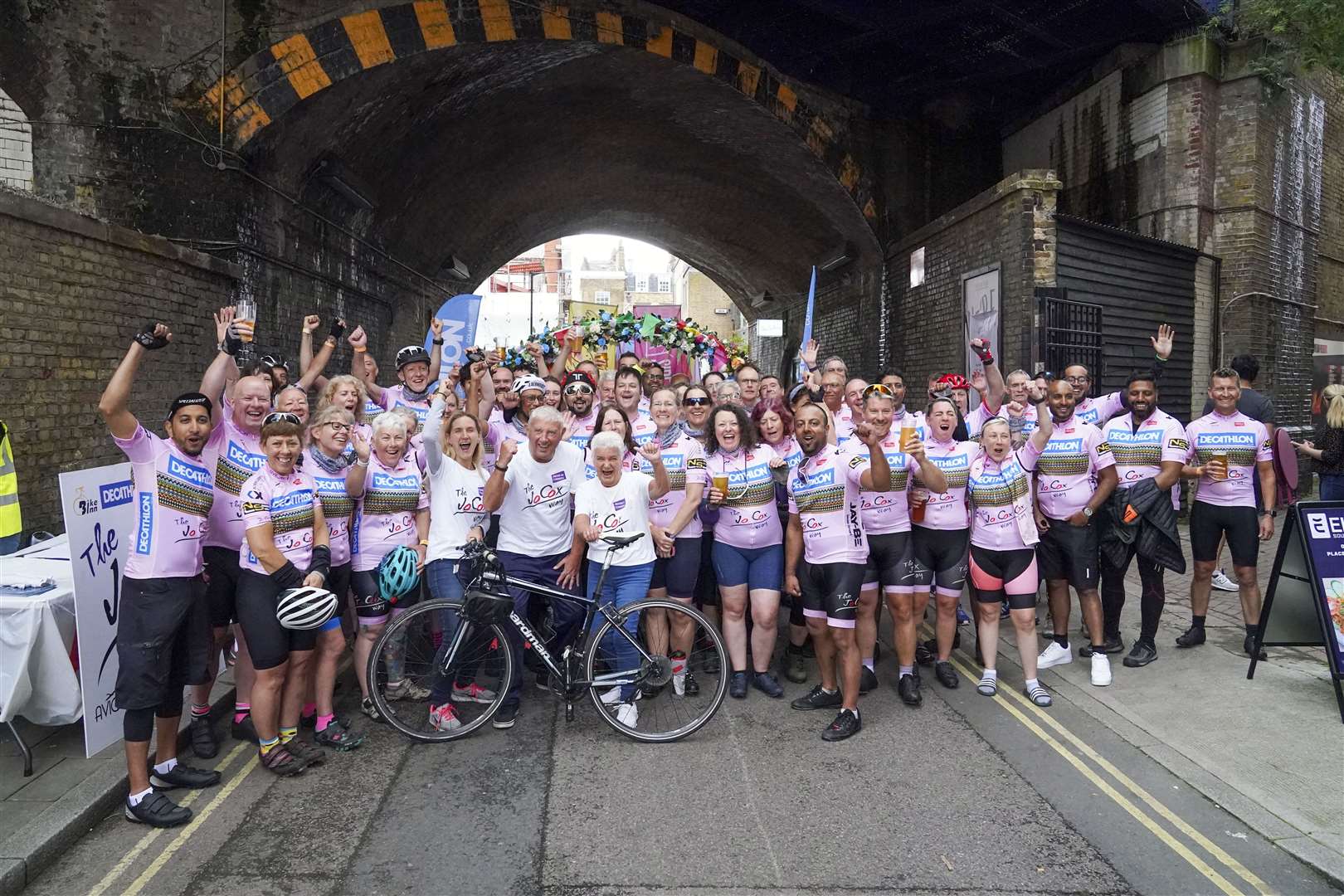 The cyclists at the end of their gruelling ride (Steve Parsons/PA)