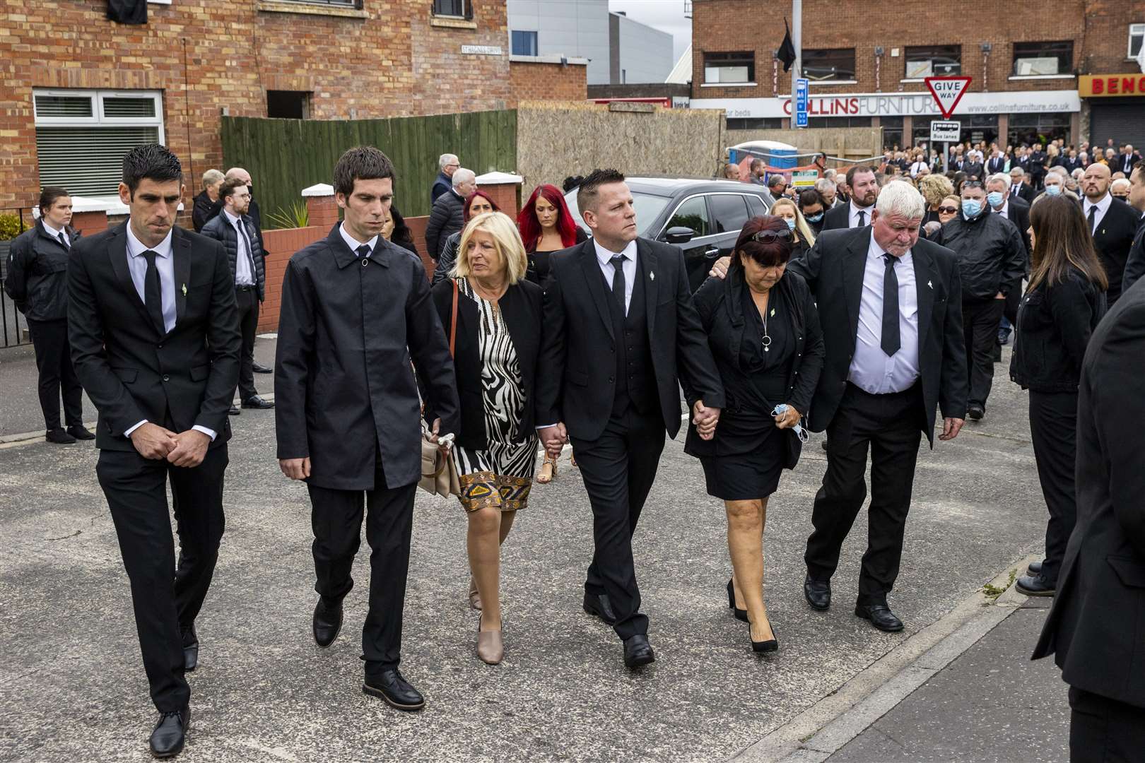 Bobby Storey’s wife and sons arrive at St Agnes’ Church in west Belfast for his funeral (Liam McBurney/PA)