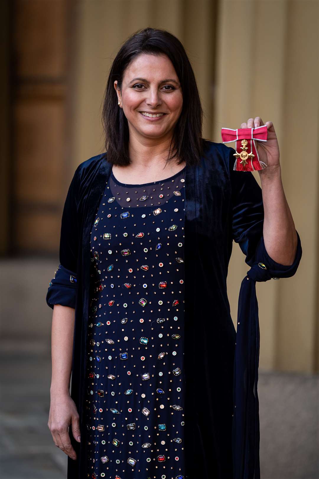 Taban Shoresh after being made an OBE (Officer of the Order of the British Empire) at an investiture ceremony at Buckingham Palace (Aaron Chown/PA)