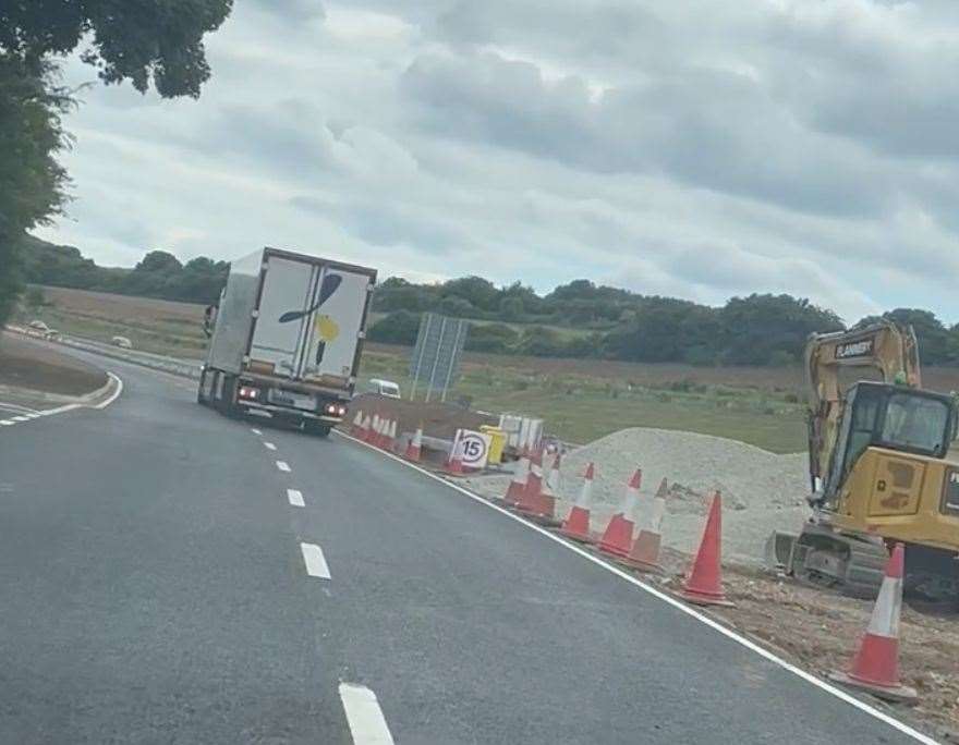 A lorry was seen reversing back up the road