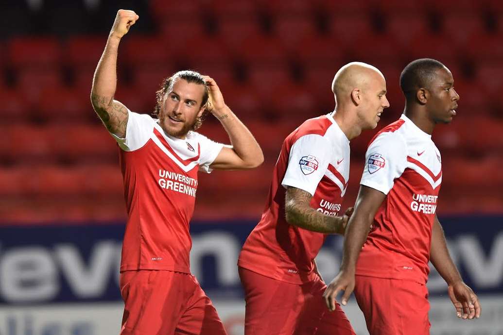 Lawrie Wilson celebrates with Charlton team-mates Picture: Keith Gillard