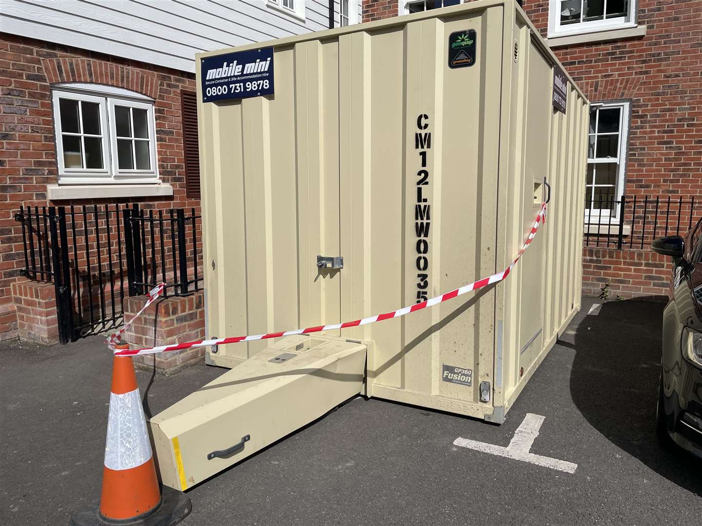 The offending portaloo sits directly in front of windows and doors