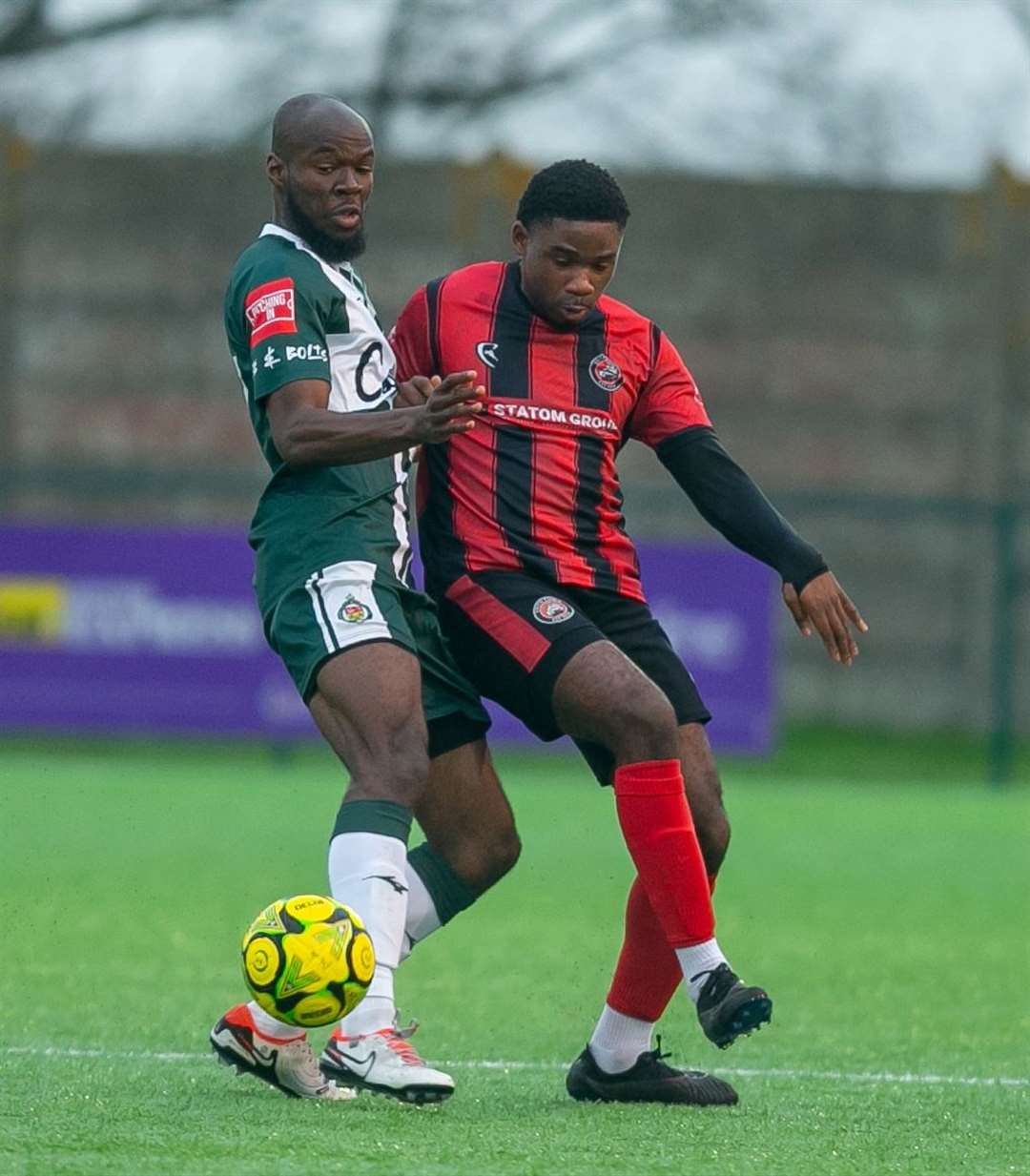 Ashford United defender Tolu Jonah, left, in action against Erith Town. Picture: Ian Scammell