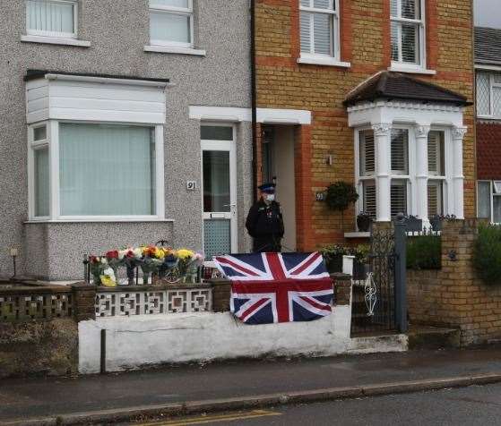 Floral tributes have been laid outside the Dartford Road home where a man was found dead on Tuesday. Photo: UK News and Pictures