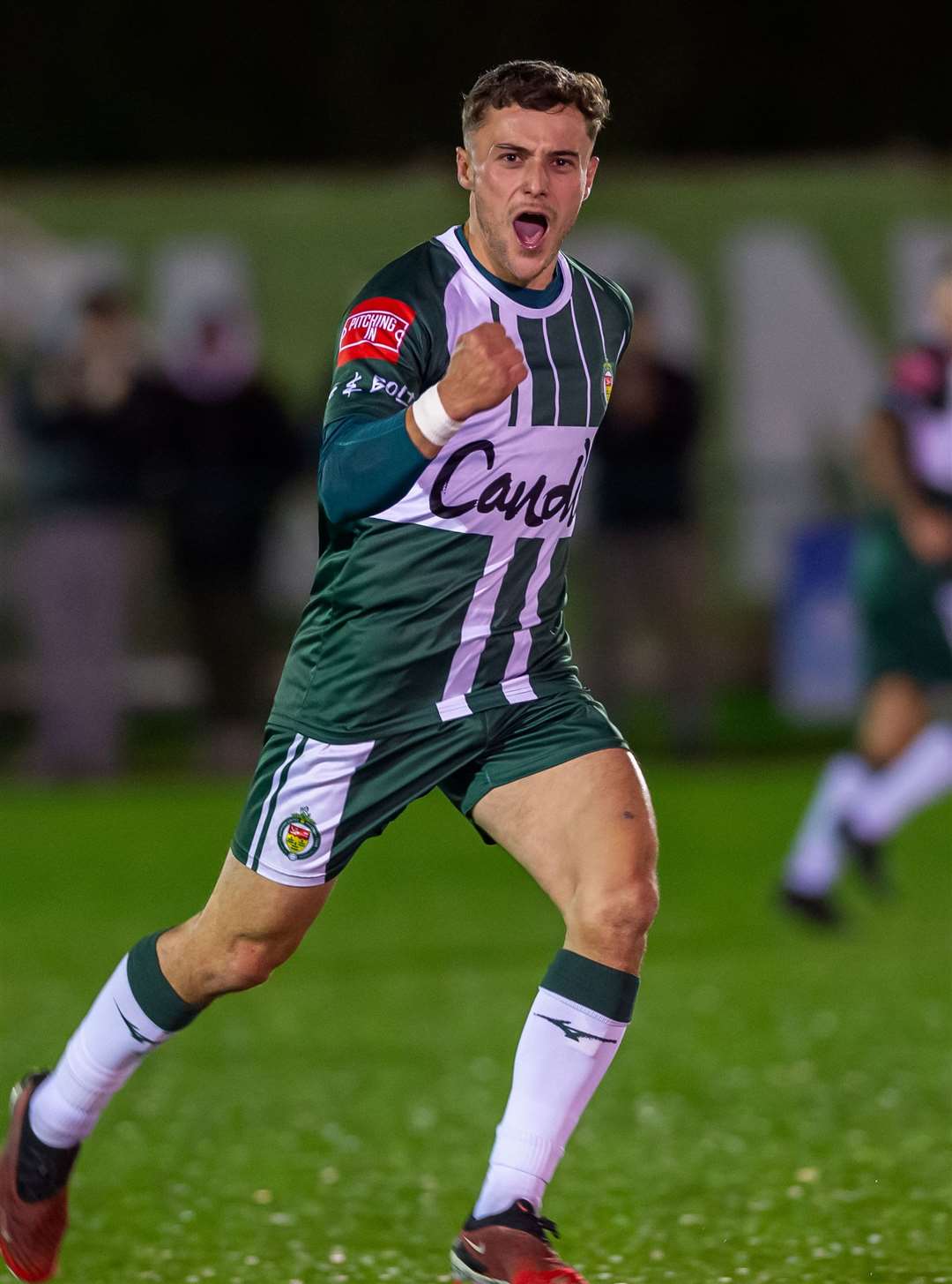 Louis Collins celebrates his equaliser for Ashford against Littlehampton. Picture: Ian Scammell