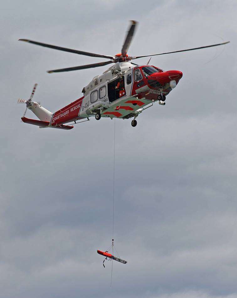 A stretcher is lowered to the beach. Picture: Nigel Scutt