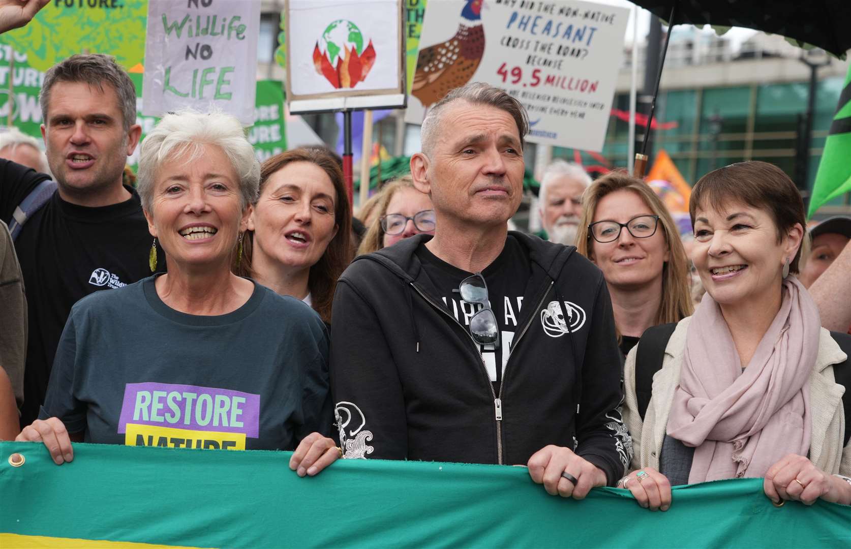 Dame Emma Thompson, Dale Vince and Caroline Lucas during a Restore Nature Now protest in central London (Jeff Moore/PA)