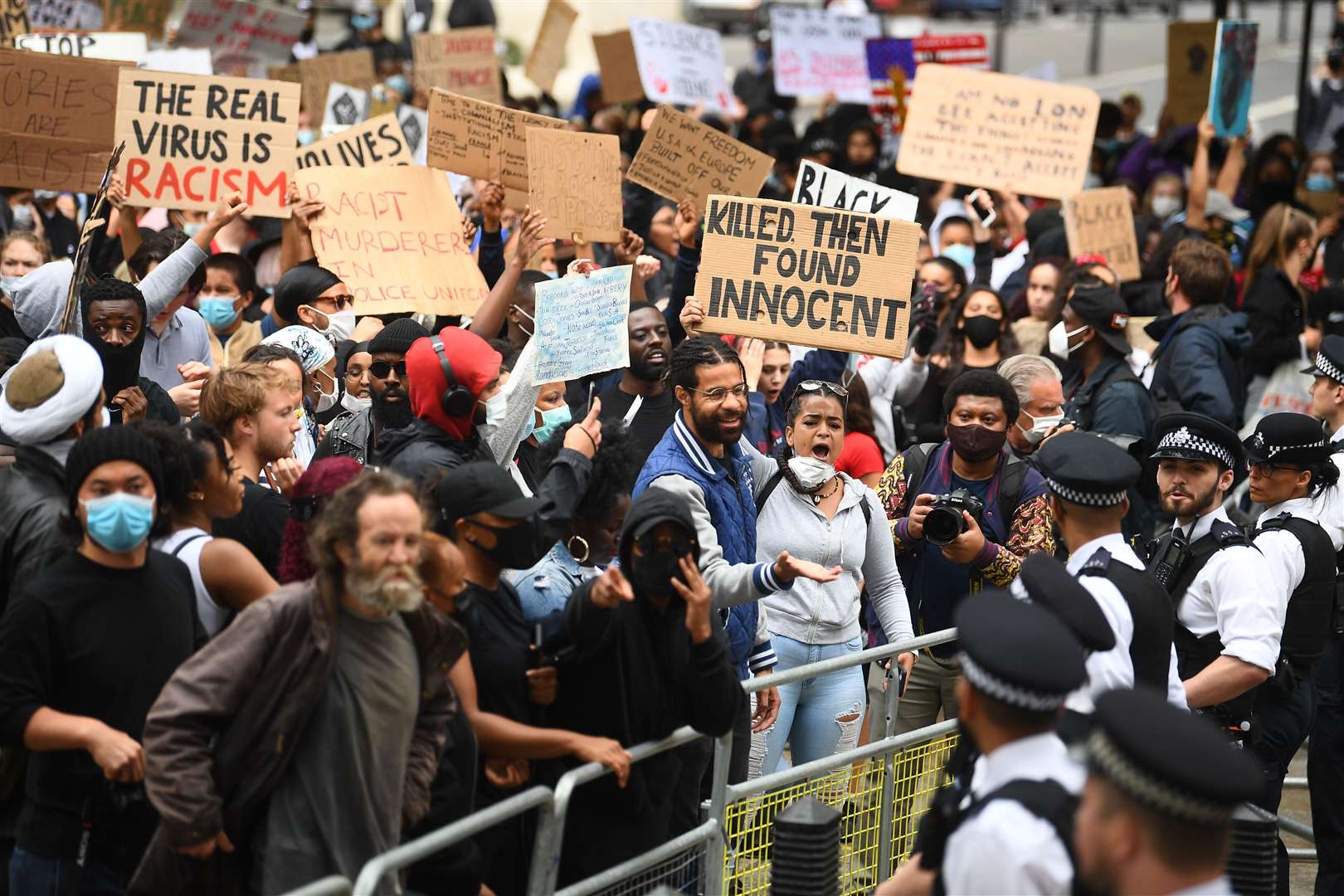 Demonstrators at a Black Lives Matter protest rally outside the gates of Downing Street (Victoria Jones/PA)