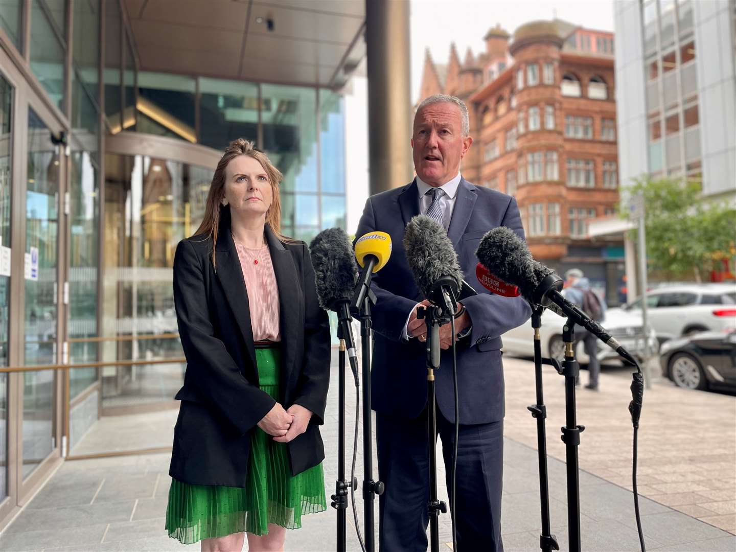 Sinn Fein MLAs Caoimhe Archibald and Conor Murphy speak to the media (David Young/PA)