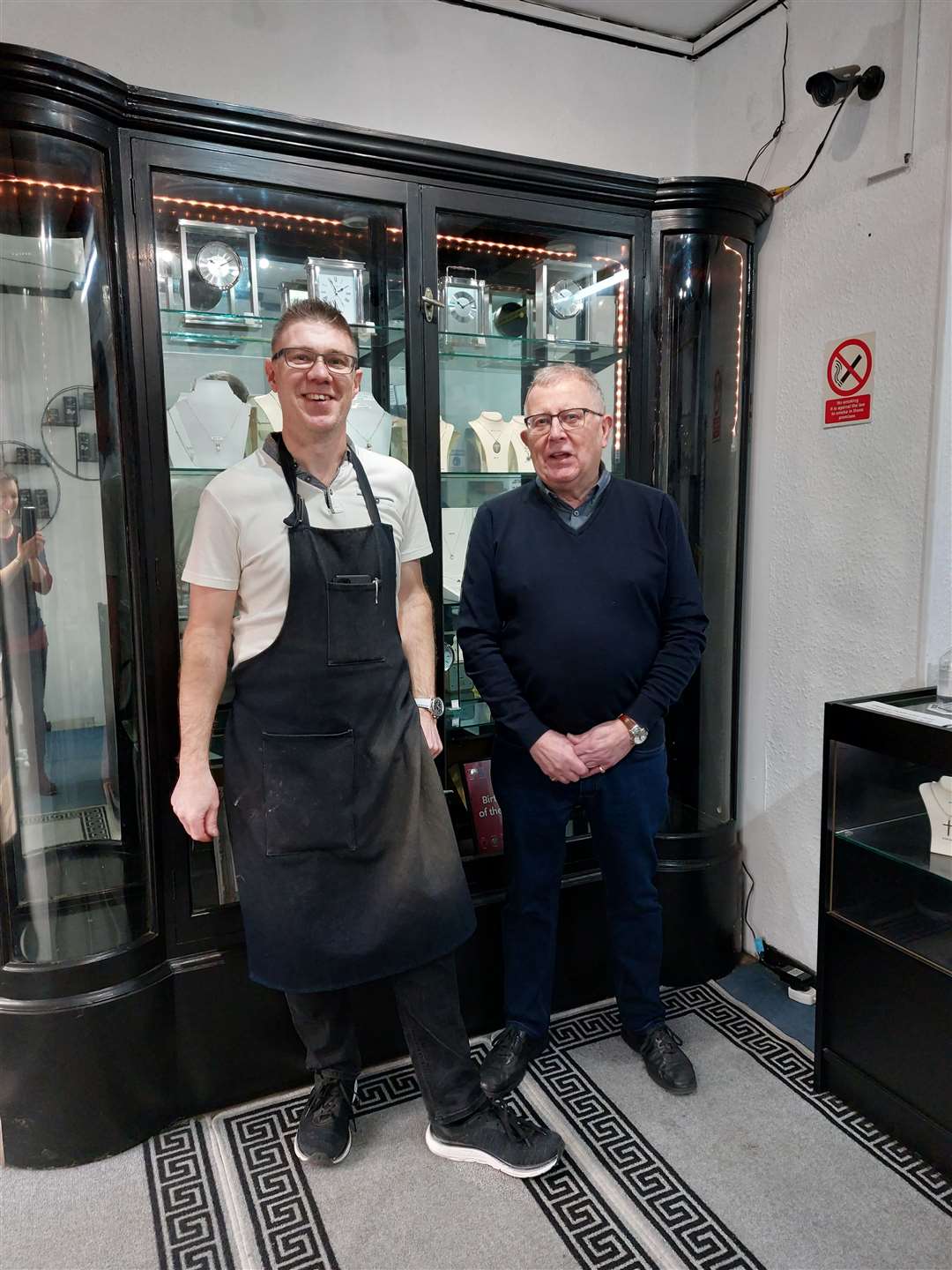 Father and son Martyn and Alan Cumming inside the store