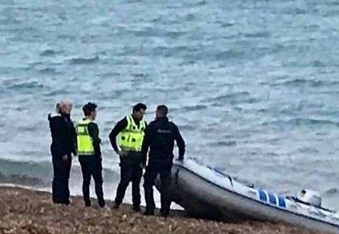 Police examined the abandoned dinghy. Lifejackets were also found at the scene. Photo: Jason Moves