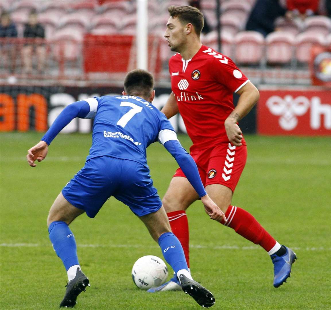 Ebbsfleet defender Tyler Cordner is closed down by Chesterfield's Joe Rowley. Picture: Sean Aidan FM20700487