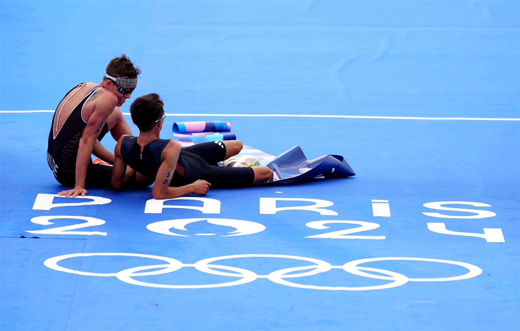 Great Britain’s Alex Yee with New Zealand’s Hayden Wilde following the men’s triathlon (David Davies/PA)