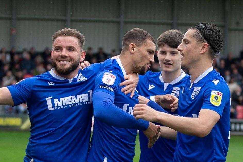 Alex MacDonald, Cheye Alexander, Josh Chambers and Tom Nichols celebrate the goal at Salford