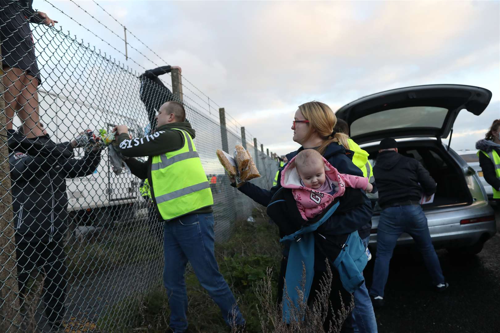 The young and the very young have turned up with supplies. Picture: Barry Goodwin