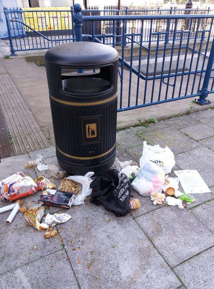 Trash strewn around an emptied bin at the seafront entrance to the A20 Townwall Street underpass,, Dover. Picture: Augusta Pearson, AFMID