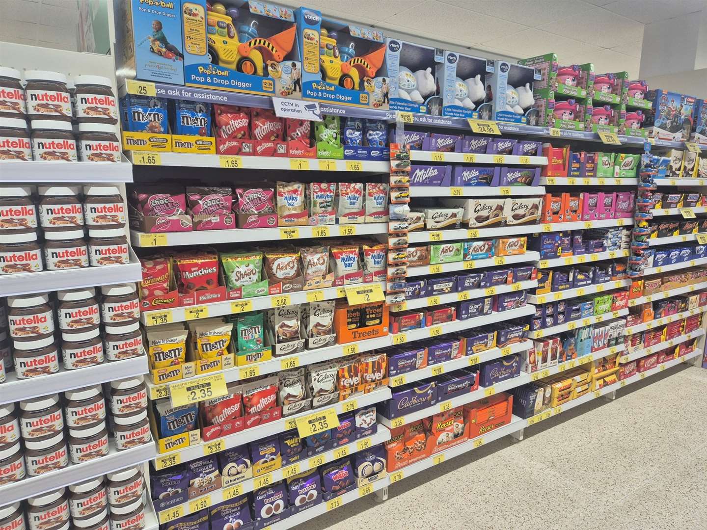 Shelves filled with chocolate and sweets