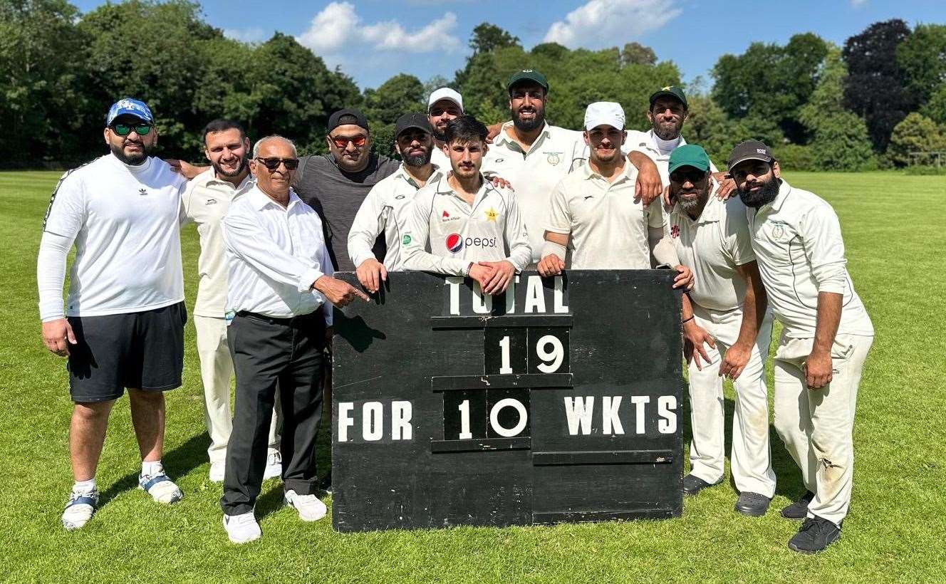 Mohammad Yaseen, centre, with Holborough team-mates after bowling out Bearsted for 19.