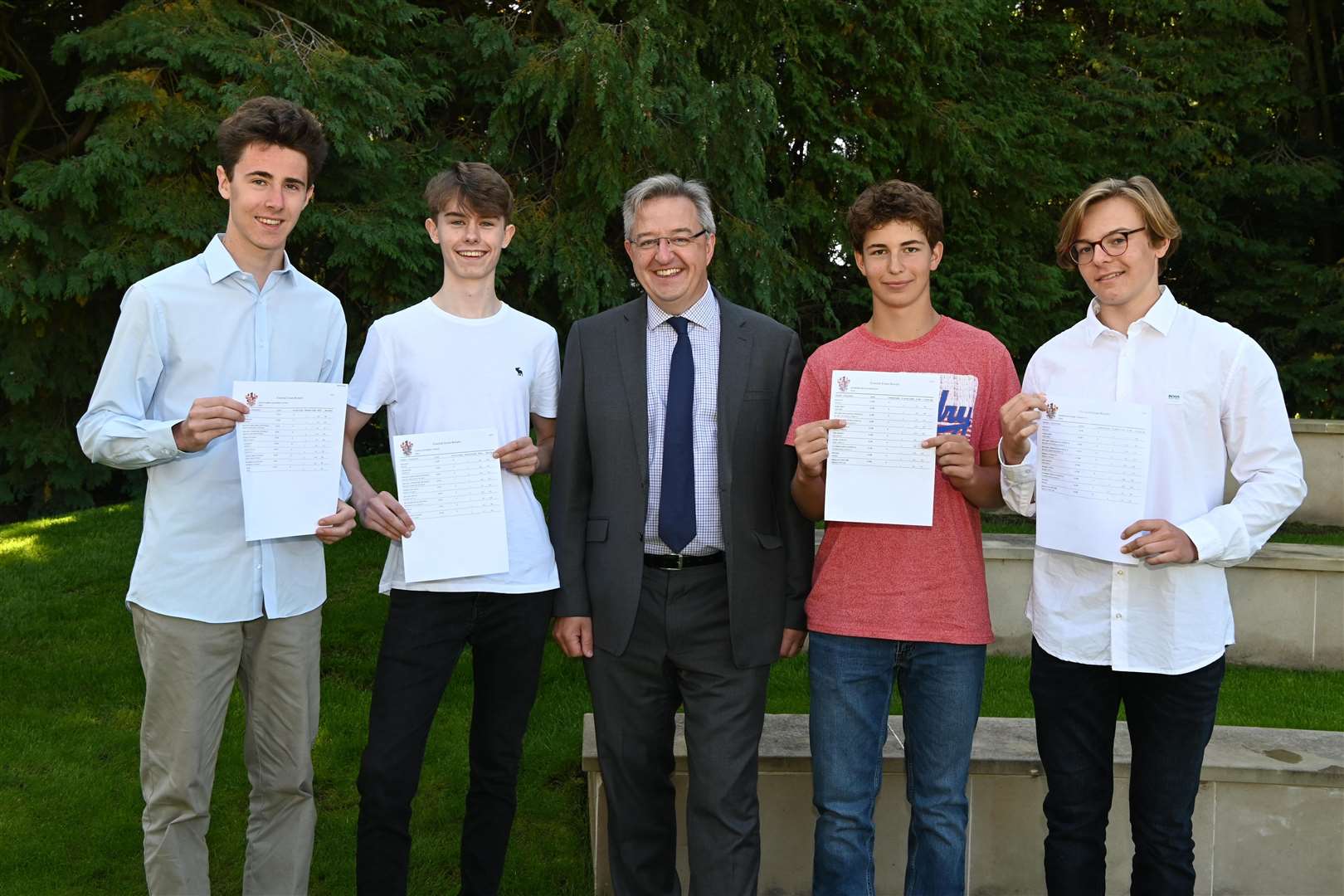 Tonbridge School on GCSE results day. James Craggs, Alex Everill, James Priory (Headmaster), Tom Roxburgh and Will Instance (15610284)