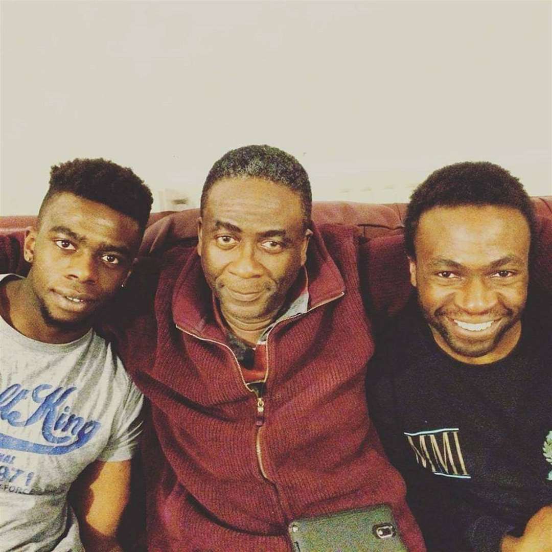 Lobby Akinnola (right) with his father Femi (centre) and brother Tugbi (left) (Lobby Akinnola/PA)