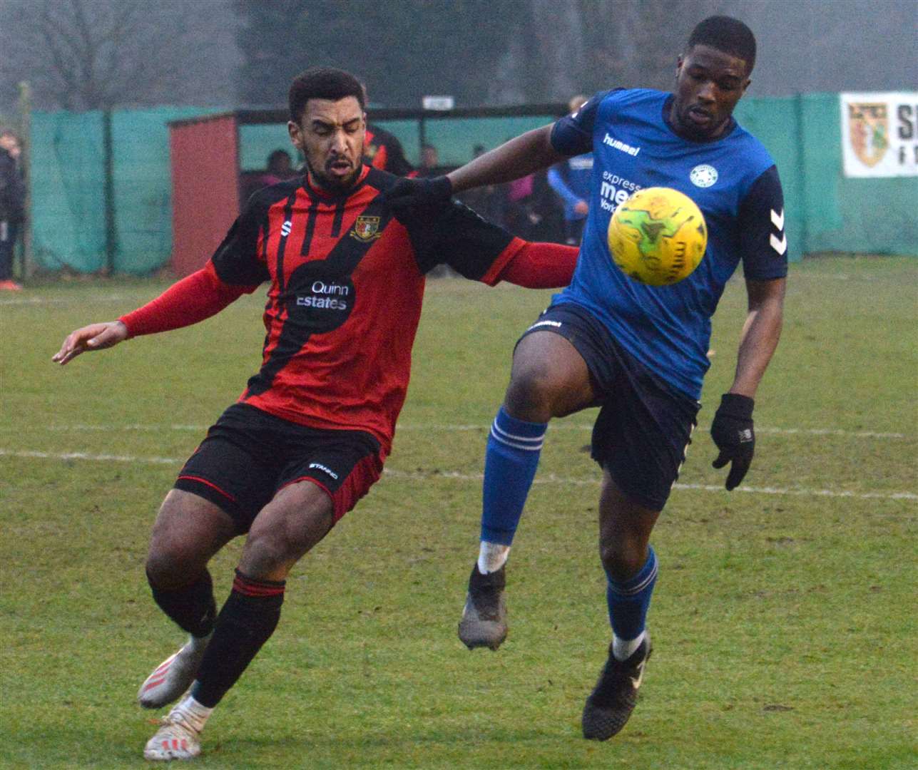 Sittingbourne (red) battle Whyteleafe during Saturday's 1-0 defeat at Woodstock Park Picture: Chris Davey
