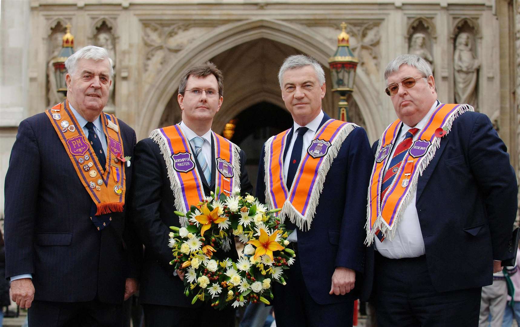 Members of the Orange Order, left to right, Lord Kilclooney, Sir Jeffrey Donaldson, David Burnside and Michael Phelan outside Westminster Abbey (Fiona Hanson/PA)