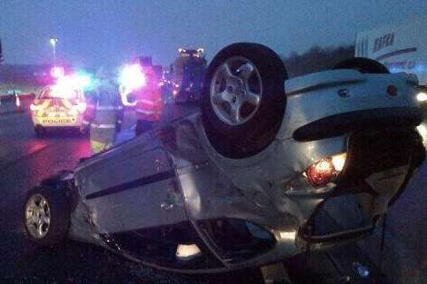 An overturned car blocked the M25 into Kent. Picture: @SurreyRoadCops