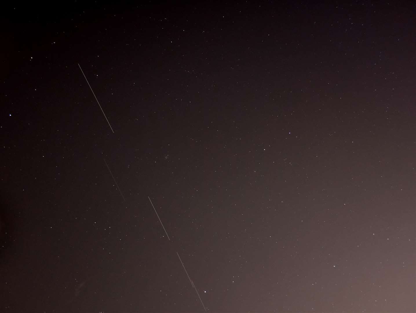 Then lights started appearing in the sky. They turned out to be Space X satelittes. These were captured in Gravesend. Picture: Jason Arthur