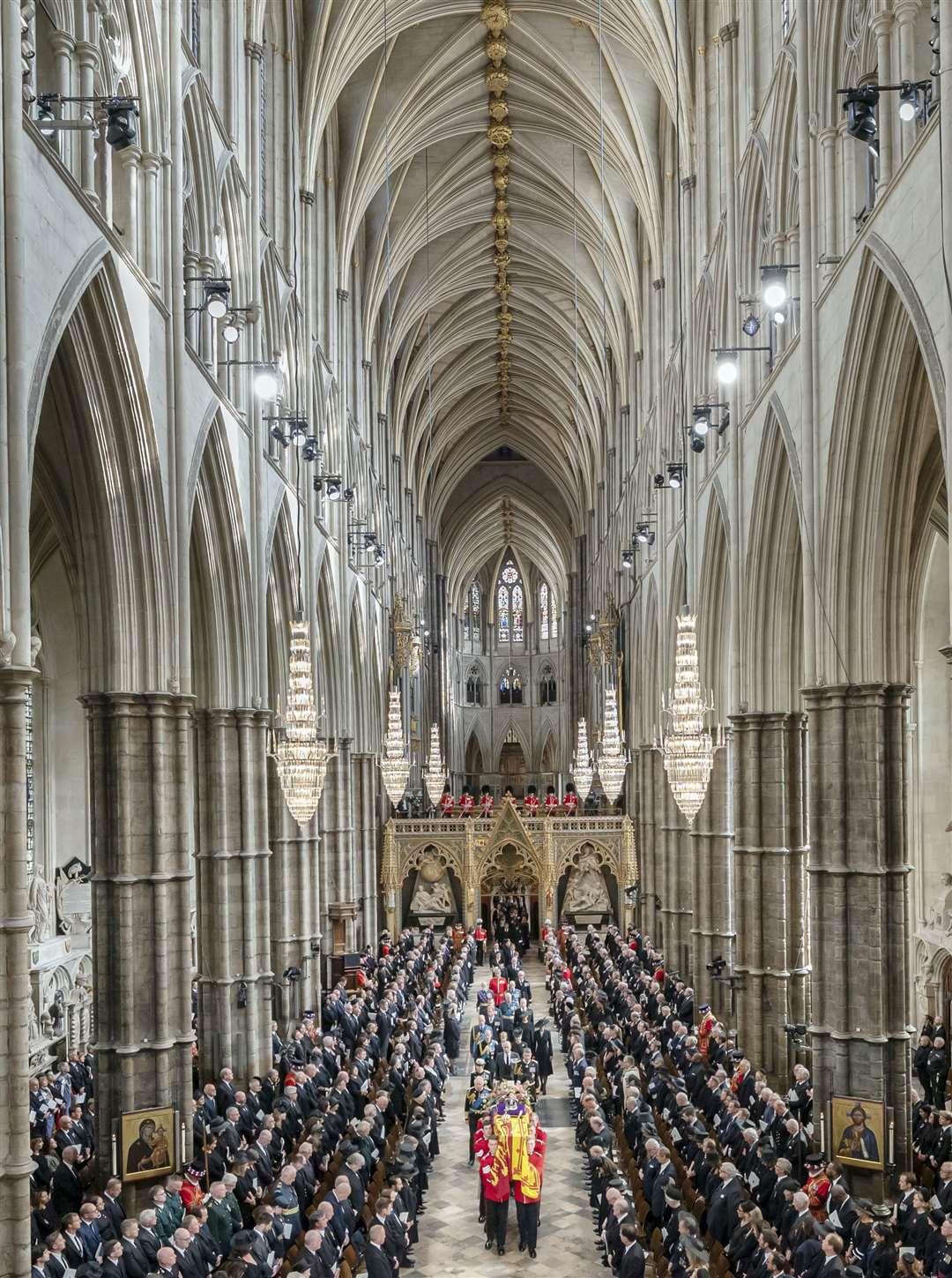 Elizabeth II’s coffin is carried out of the abbey after her state funeral (Danny Lawson/PA)