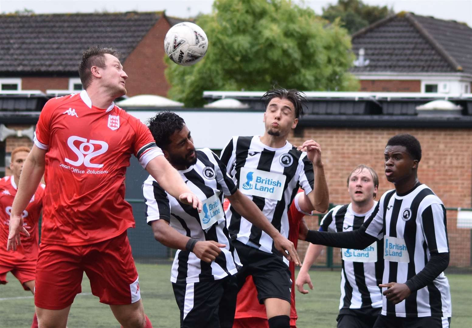 Captain Callum Davies puts his header just wide for Faversham at Fisher. Picture: Alan Coomes