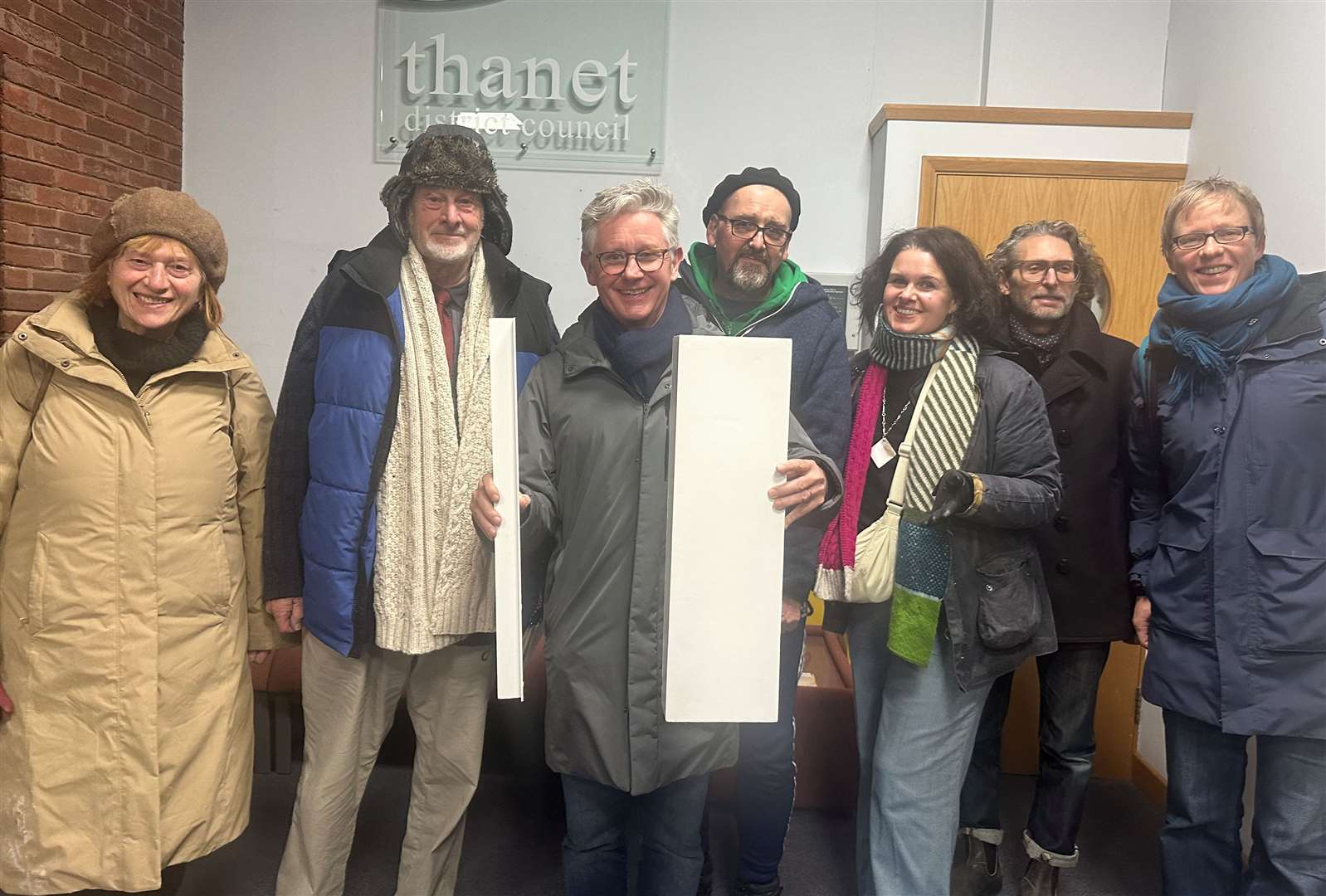 Margate's Arlington House residents with their polystyrene window frames after the meeting