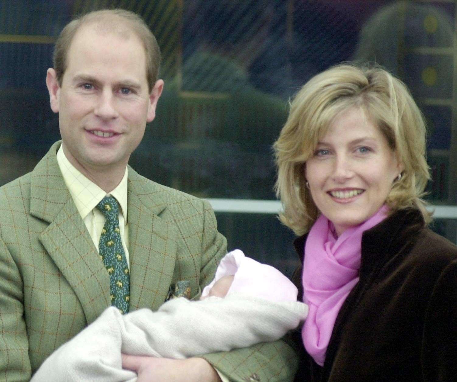 The Earl and Countess of Wessex leaving Frimley Park Hospital with Lady Louise in 2003 (Johnny Green/PA)