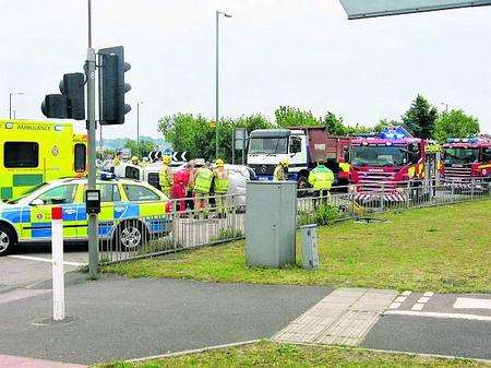 Emergency crews deal with the aftermath of an accident between a Peugeot people carrier and a lorry at Anthony's Way, Strood.